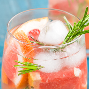 Raspberry peach gin fizz